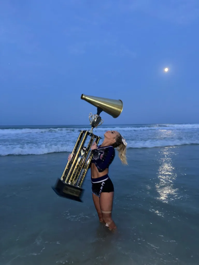 Hailey D'Lynn Smith Winning NCA Nationals with Weber State. Prior to Miami Metal with Pro League Cheer